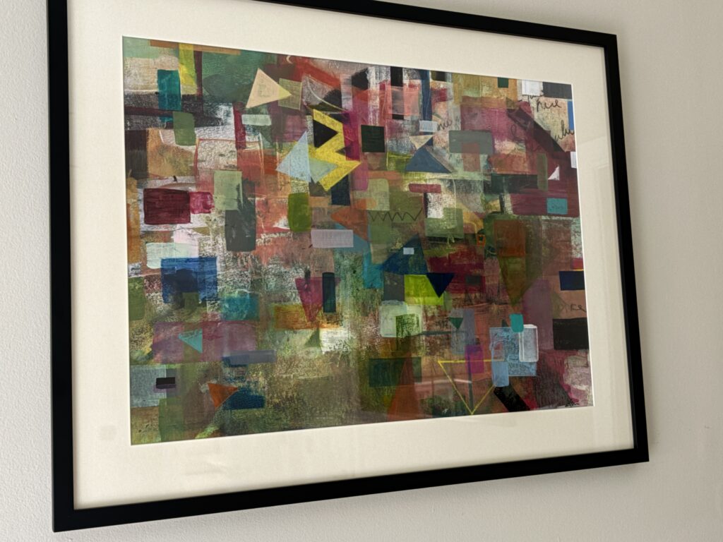 The Circle Dreamed, original abstract acrylic painting by Kim McCauley, shown framed with a cream mat and black frame